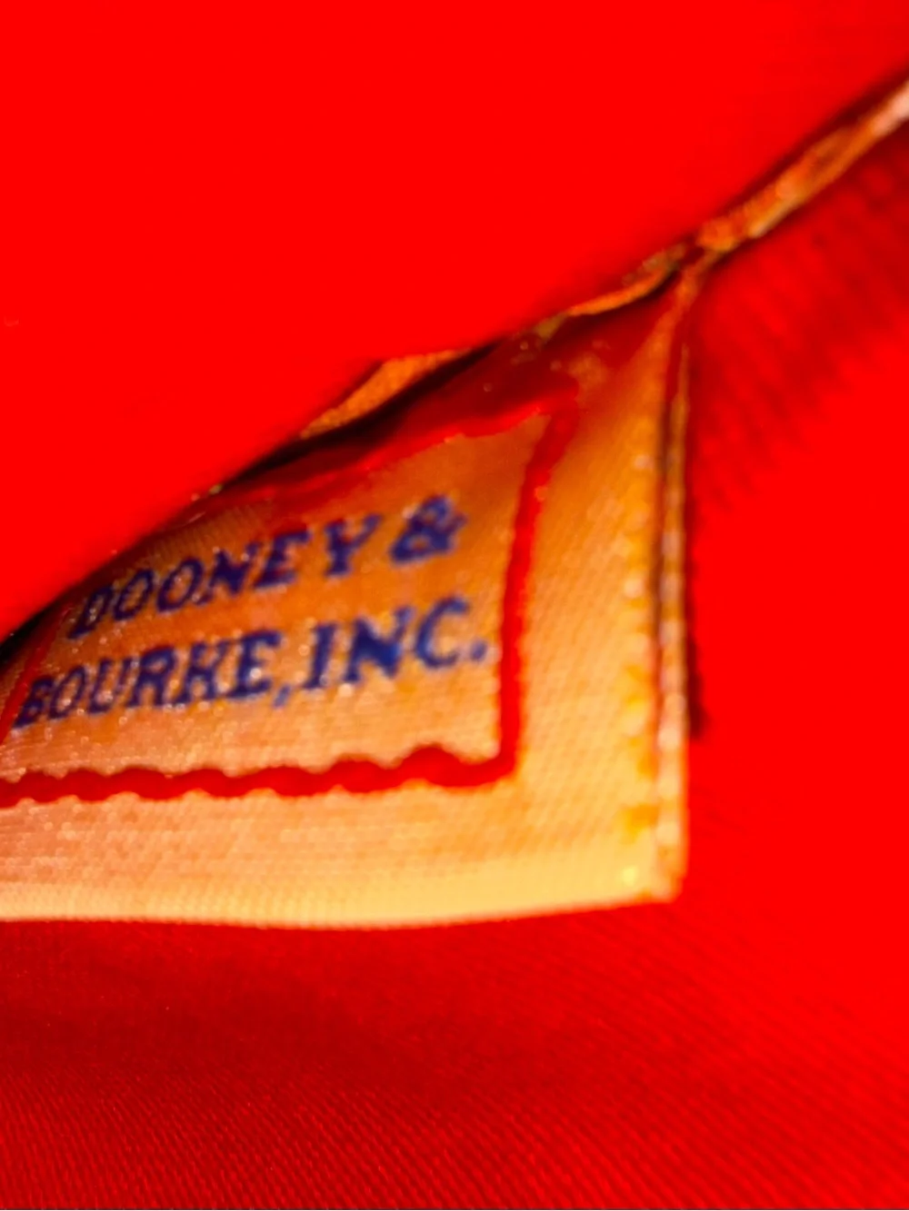 Vintage Dooney & Bourke Orangeish Red Leather Crossbody with Tassel